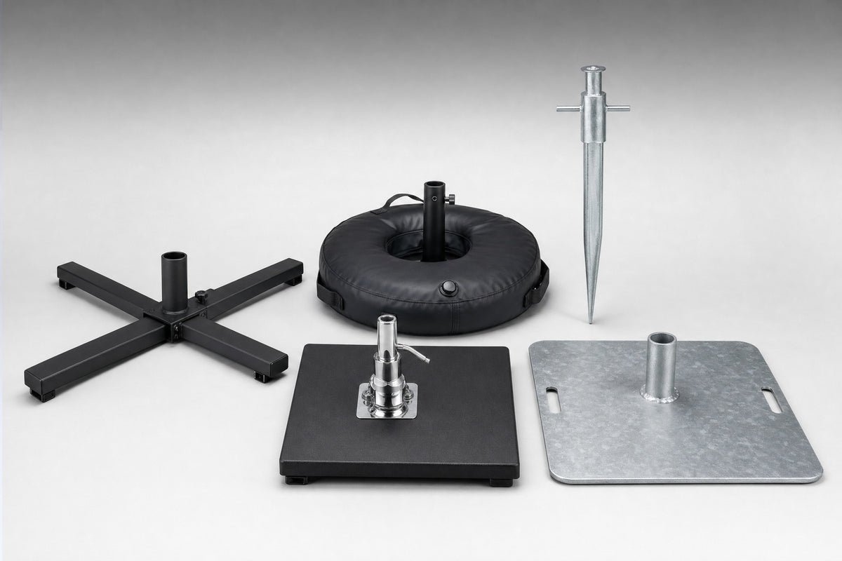 Accessoires de mât : base en croix, sac à eau, piquet de sol, plaque de base et plaque pour roue